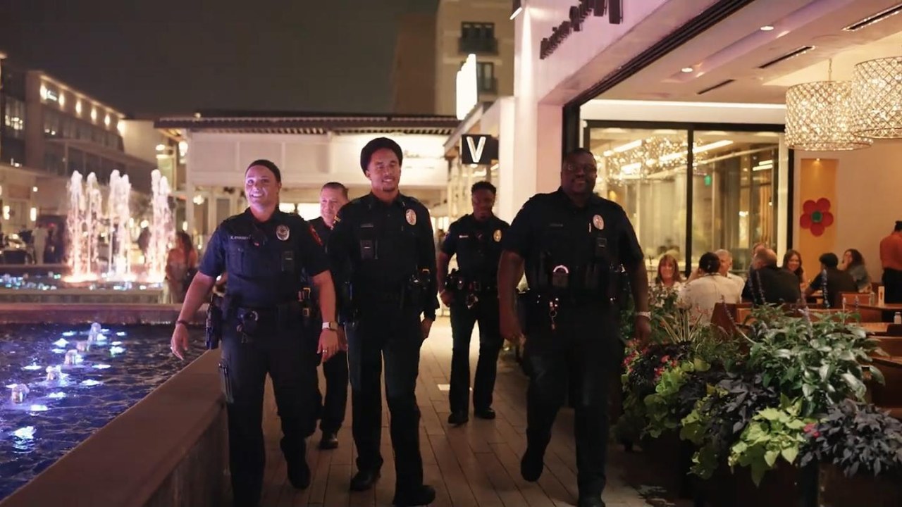 Plano police officers on foot patrol at Legacy West at night, filmed by Tone Films for the department's recruitment video