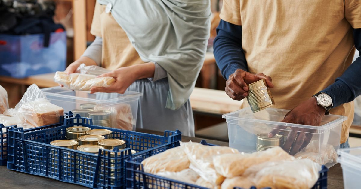 NYC nonprofit video production crew filming volunteers preparing donations at a Manhattan program site
